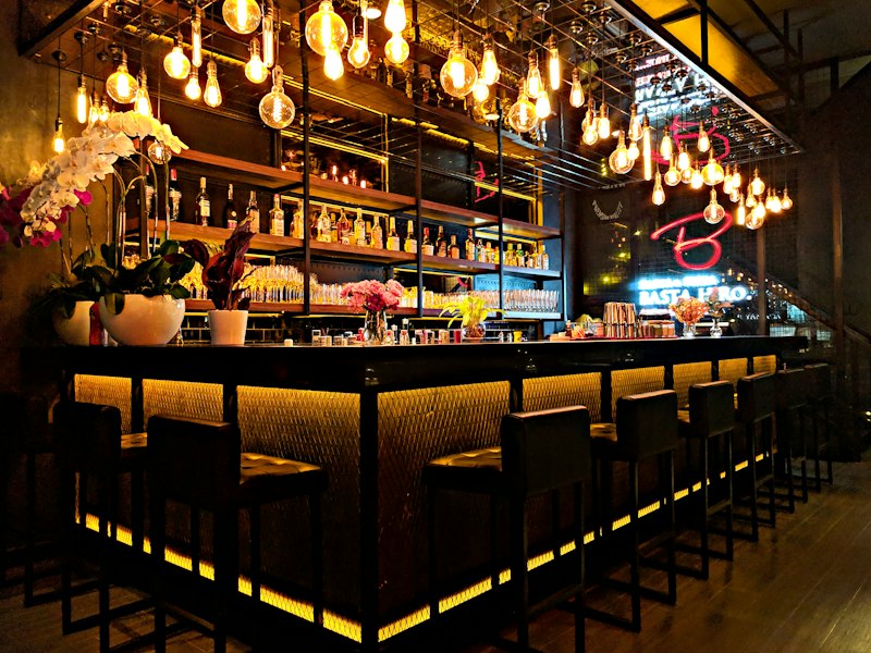 Warm tavern interior with wooden tables